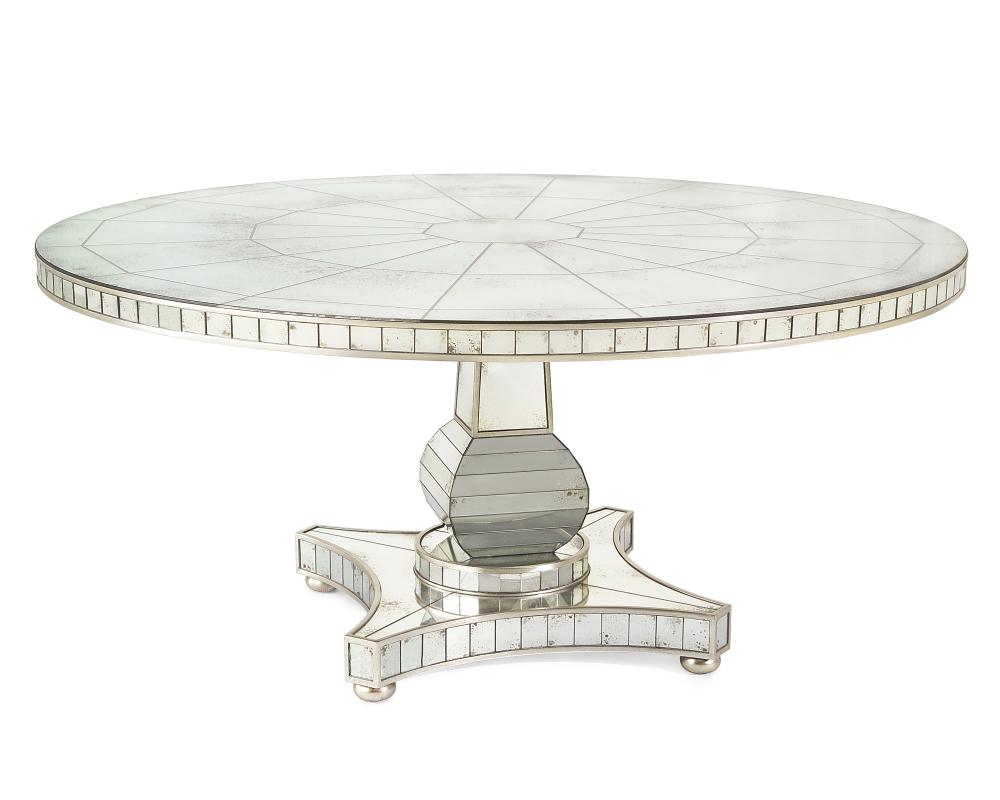 Reflections Dining Table. The mouldings and bun feet are finished in distressed silver whilst the ta